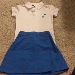 Girl Scout Daisy skirt and shirt.